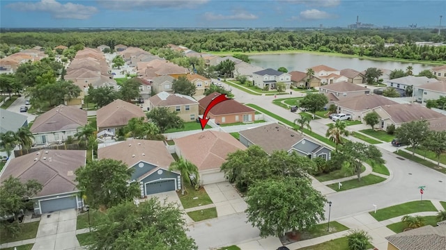 7603 Wood Violet Dr, Gibsonton, FL 33534 - aerial perspective of suburban area with a nearby body of water
