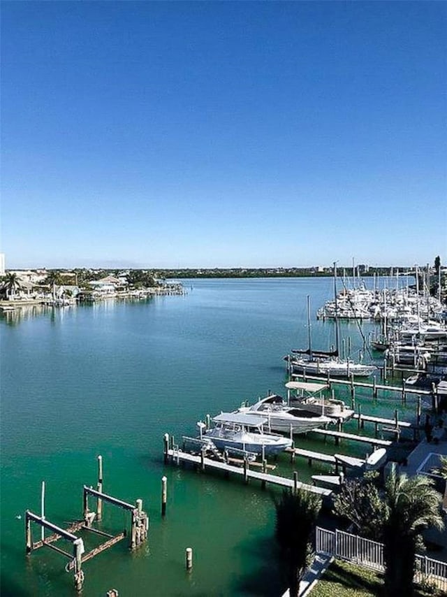 706 Bayway Blvd Unit 502, Clearwater Beach, FL 33767 - dock featuring a water view and boat lift