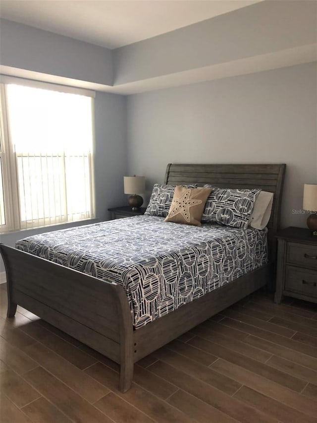 706 Bayway Blvd Unit 502, Clearwater Beach, FL 33767 - bedroom featuring wood finished floors