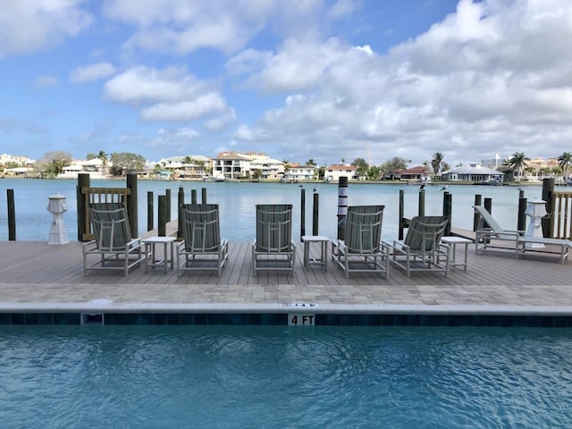 706 Bayway Blvd Unit 502, Clearwater Beach, FL 33767 - community pool featuring a deck with water view