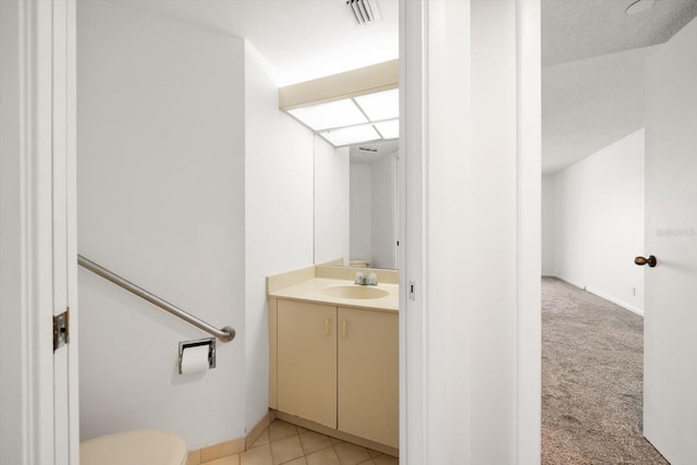 1340 Gulf Blvd Unit 12A, Clearwater Beach, FL 33767 - half bathroom featuring vanity and toilet