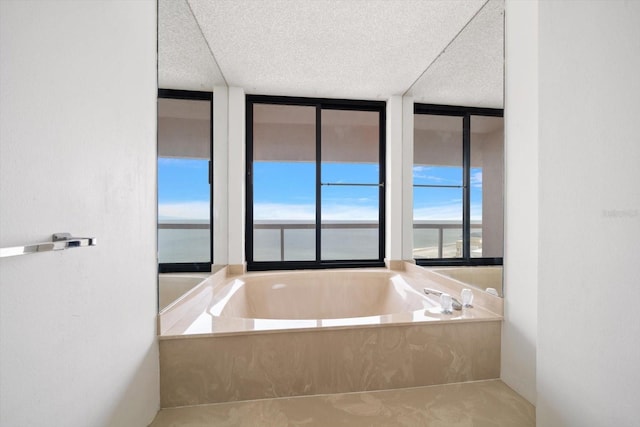 1340 Gulf Blvd Unit 12A, Clearwater Beach, FL 33767 - full bath featuring a textured ceiling and a garden tub