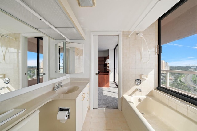 1340 Gulf Blvd Unit 12A, Clearwater Beach, FL 33767 - bathroom with tub / shower combination, vanity, and tile patterned floors
