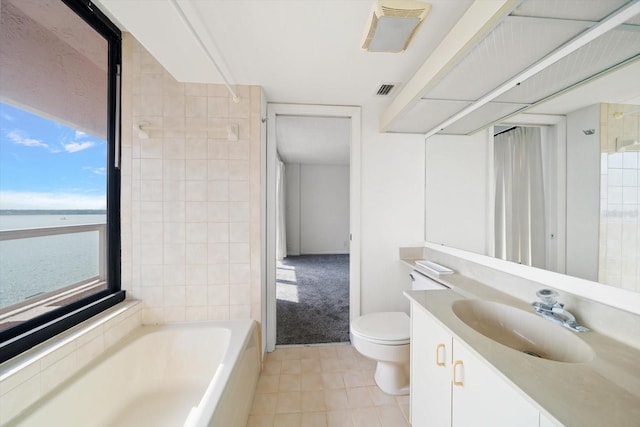 1340 Gulf Blvd Unit 12A, Clearwater Beach, FL 33767 - bathroom featuring a bathtub, a water view, vanity, a shower, and tile patterned flooring