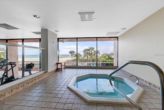 1340 Gulf Blvd Unit 12A, Clearwater Beach, FL 33767 - view of swimming pool with an in-ground hot tub