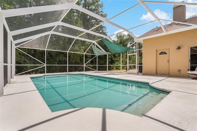 1046 Middlesex Dr, New Port Richey, FL 34655 - outdoor pool featuring a patio area and a lanai