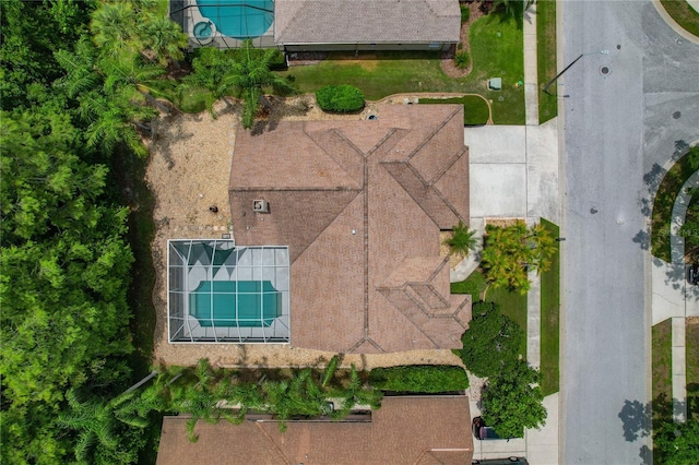 1046 Middlesex Dr, New Port Richey, FL 34655 - view from above of property with a pool area