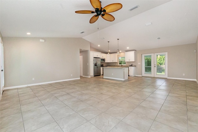 13116 Marathon Blvd, Port Charlotte, FL 33981 - unfurnished living room featuring ceiling fan, vaulted ceiling, light tile patterned floors, and recessed lighting
