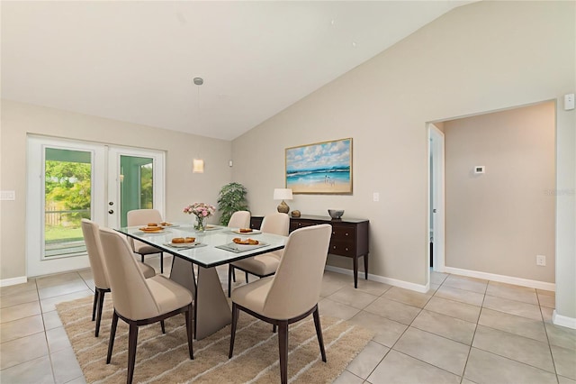 13116 Marathon Blvd, Port Charlotte, FL 33981 - dining space featuring light tile patterned floors, french doors, and high vaulted ceiling