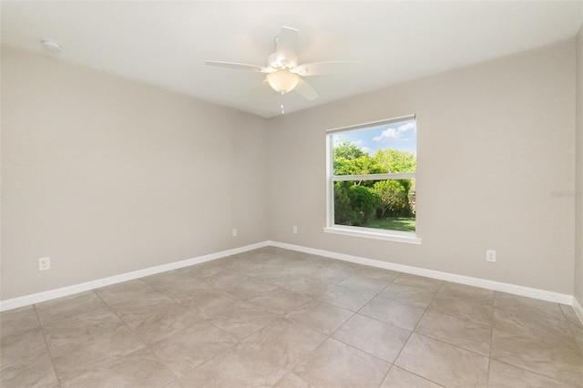 13116 Marathon Blvd, Port Charlotte, FL 33981 - empty room with ceiling fan and a smoke detector