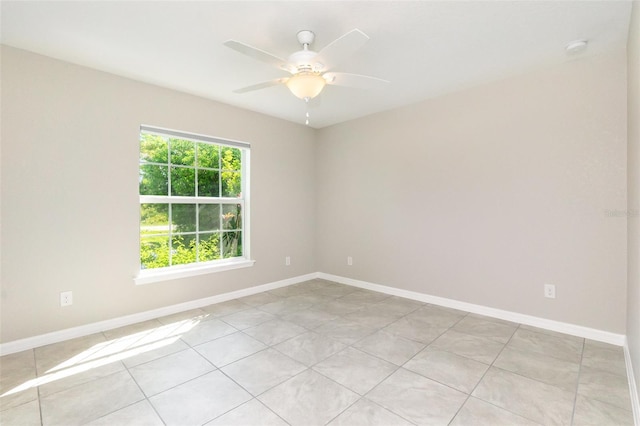 13116 Marathon Blvd, Port Charlotte, FL 33981 - unfurnished room featuring ceiling fan, light tile patterned floors, and a smoke detector