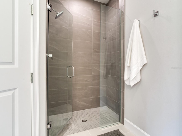 5317 Rushmere Ct, Palmetto, FL 34221 - bathroom with a shower stall and tile patterned flooring