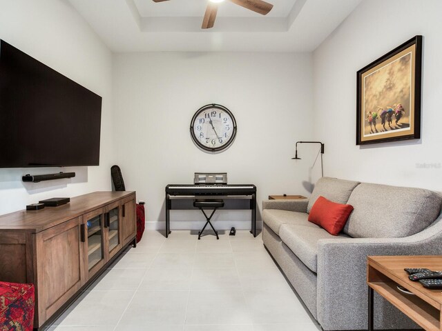5317 Rushmere Ct, Palmetto, FL 34221 - living area featuring a tray ceiling and ceiling fan