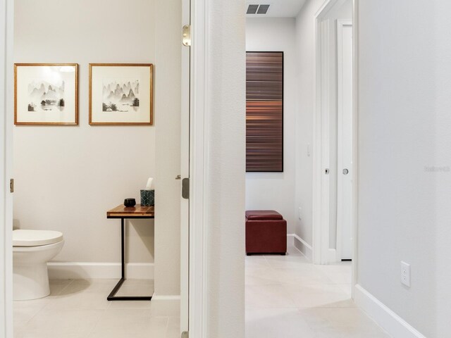 5317 Rushmere Ct, Palmetto, FL 34221 - bathroom featuring toilet and tile patterned floors