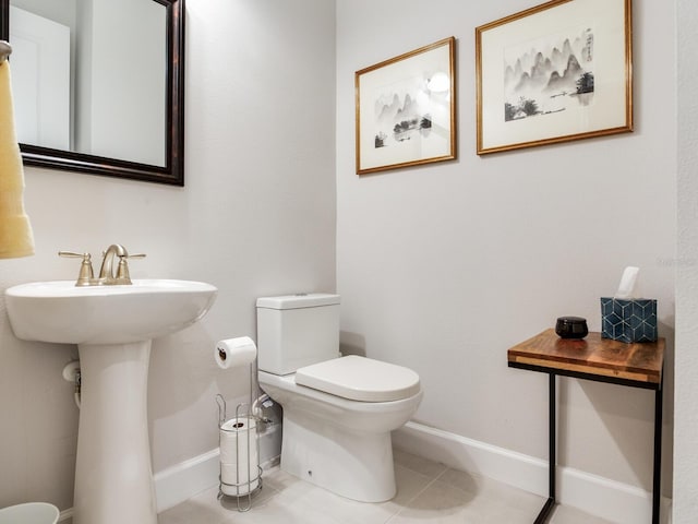 5317 Rushmere Ct, Palmetto, FL 34221 - half bathroom with baseboards and tile patterned flooring