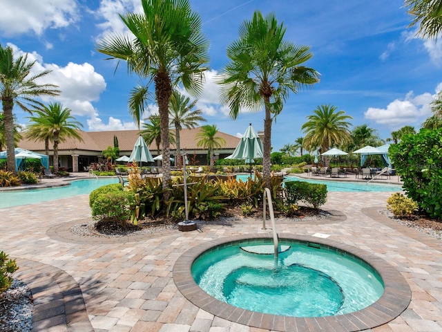 5317 Rushmere Ct, Palmetto, FL 34221 - community pool featuring a hot tub and a patio