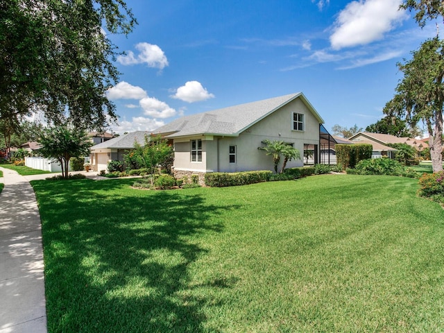 3503 Graycliff Ln, Brandon, FL 33511 - view of side of property featuring stucco siding and a garage