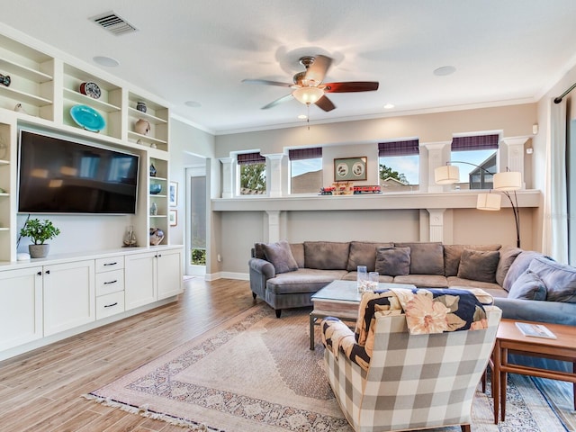 3503 Graycliff Ln, Brandon, FL 33511 - living area featuring a ceiling fan, light wood-type flooring, and crown molding