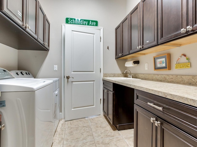 3503 Graycliff Ln, Brandon, FL 33511 - laundry area with independent washer and dryer, cabinet space, and light tile patterned floors