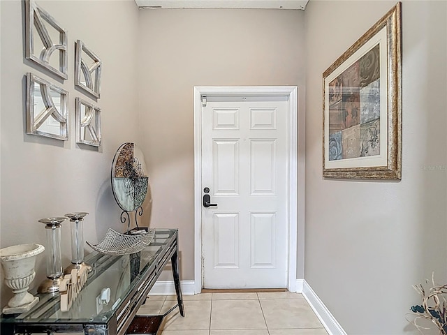 18339 Fish Loop, Land O Lakes, FL 34638 - entrance foyer featuring light tile patterned floors and baseboards
