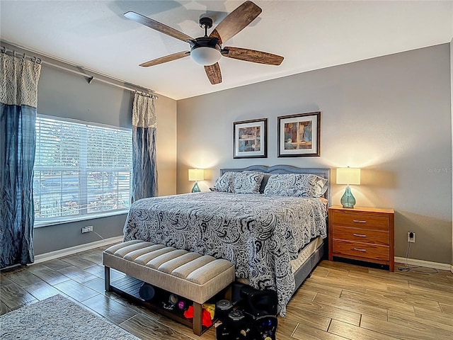 18339 Fish Loop, Land O Lakes, FL 34638 - bedroom with wood finished floors and ceiling fan