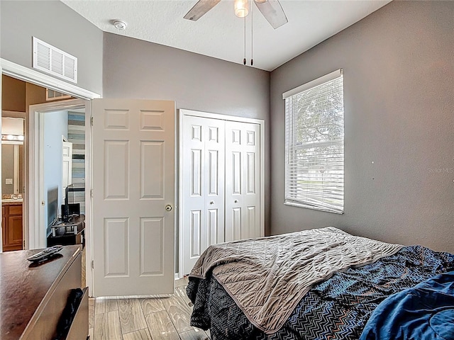 18339 Fish Loop, Land O Lakes, FL 34638 - bedroom featuring a closet and a ceiling fan