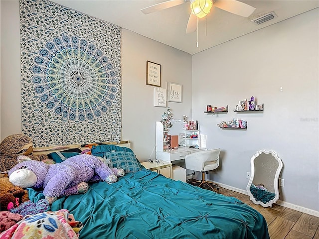 18339 Fish Loop, Land O Lakes, FL 34638 - bedroom with wood finished floors and ceiling fan