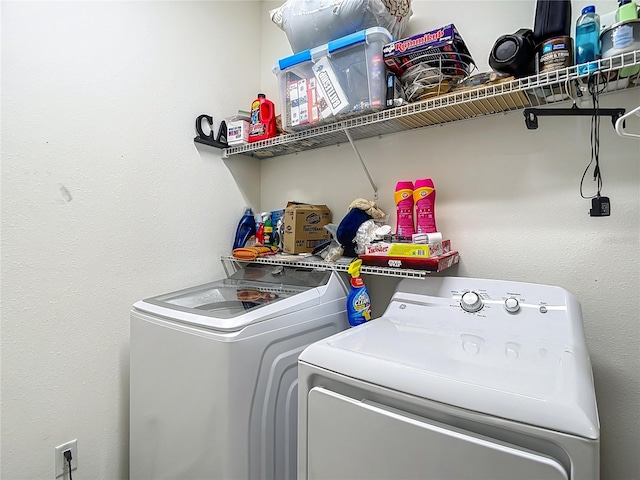 18339 Fish Loop, Land O Lakes, FL 34638 - laundry room featuring washer and dryer