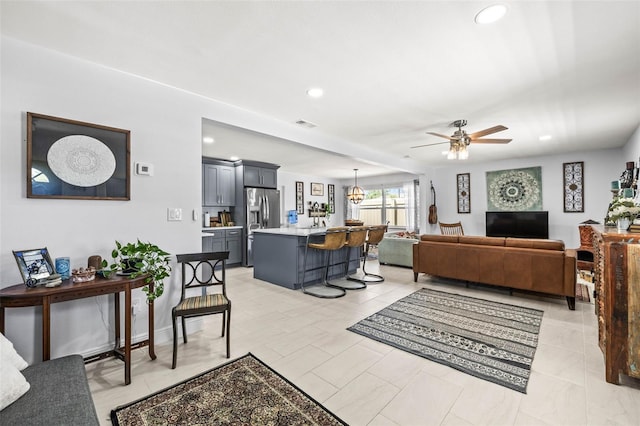 1406 Nebraska Ave, Palm Harbor, FL 34683 - living room with a ceiling fan and recessed lighting