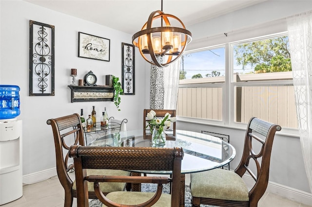 1406 Nebraska Ave, Palm Harbor, FL 34683 - tiled dining room with a chandelier and baseboards