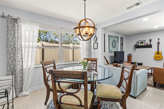 1406 Nebraska Ave, Palm Harbor, FL 34683 - dining room with a chandelier and recessed lighting