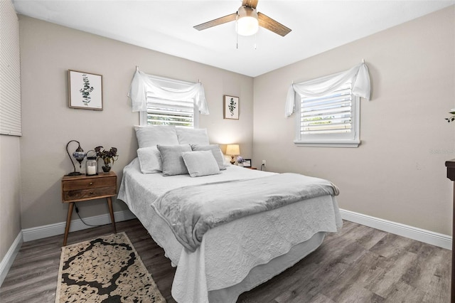 1406 Nebraska Ave, Palm Harbor, FL 34683 - bedroom with wood finished floors and a ceiling fan