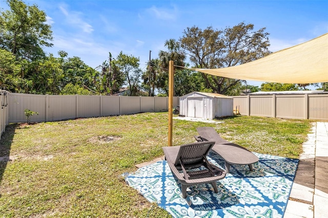 1406 Nebraska Ave, Palm Harbor, FL 34683 - fenced backyard with a storage shed and a patio
