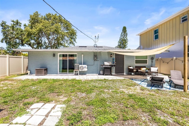 1406 Nebraska Ave, Palm Harbor, FL 34683 - back of house featuring a patio, board and batten siding, a fenced backyard, and an outdoor hangout area