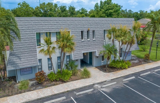 720 Lyndhurst St Unit 1101, Dunedin, FL 34698 - view of building exterior with uncovered parking