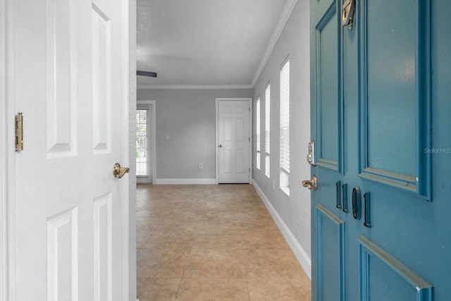 720 Lyndhurst St Unit 1101, Dunedin, FL 34698 - entrance foyer with ornamental molding and light tile patterned floors