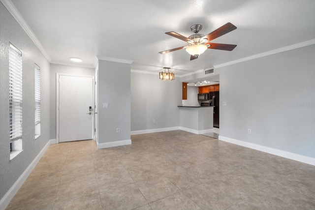 720 Lyndhurst St Unit 1101, Dunedin, FL 34698 - unfurnished living room featuring a ceiling fan and ornamental molding