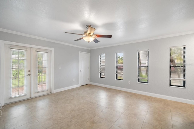720 Lyndhurst St Unit 1101, Dunedin, FL 34698 - unfurnished room featuring french doors, crown molding, ceiling fan, and light tile patterned flooring