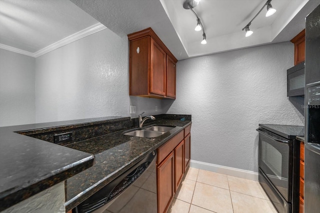 720 Lyndhurst St Unit 1101, Dunedin, FL 34698 - kitchen with black appliances, crown molding, a textured wall, dark stone counters, and light tile patterned floors