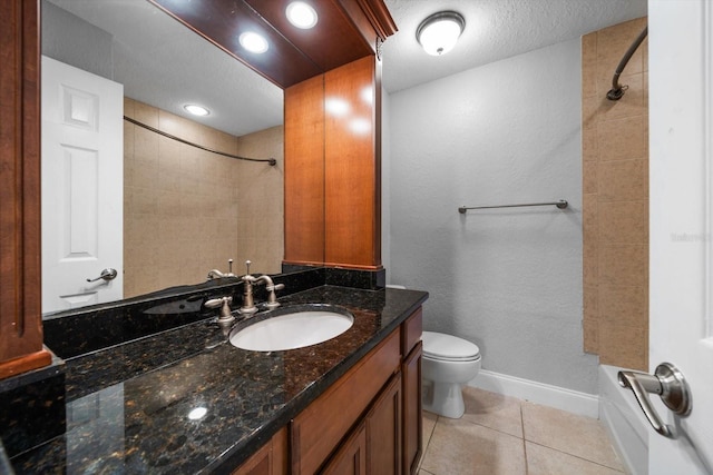 720 Lyndhurst St Unit 1101, Dunedin, FL 34698 - bathroom with vanity, tub / shower combination, tile patterned flooring, a textured ceiling, and recessed lighting