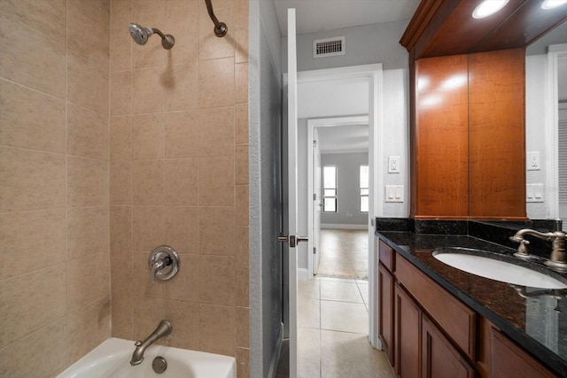 720 Lyndhurst St Unit 1101, Dunedin, FL 34698 - bathroom featuring tile patterned flooring, vanity, and shower / tub combination
