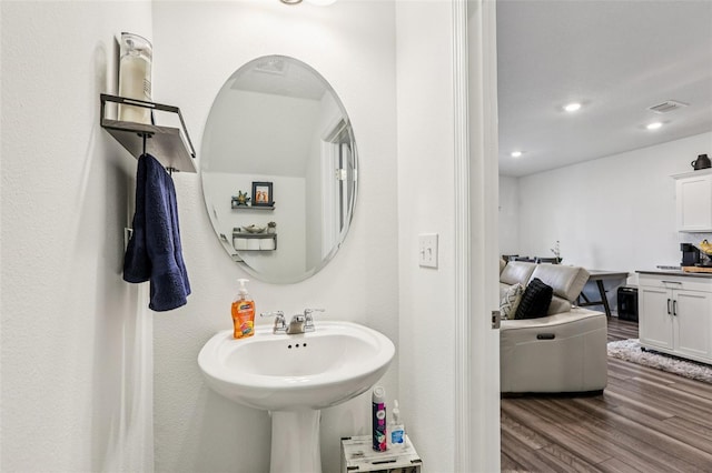 6235 Bucket Ct, Gibsonton, FL 33534 - bathroom with wood finished floors and recessed lighting