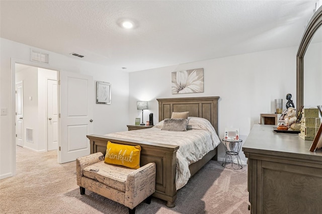 6235 Bucket Ct, Gibsonton, FL 33534 - bedroom with light carpet and a textured ceiling