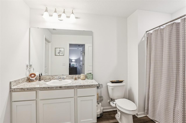 6235 Bucket Ct, Gibsonton, FL 33534 - bathroom featuring vanity, wood finished floors, and a shower with shower curtain