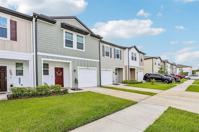 6235 Bucket Ct, Gibsonton, FL 33534 - multi unit property with a residential view, driveway, a garage, and board and batten siding
