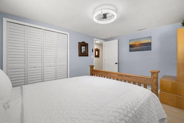 201 S St, Palm Harbor, FL 34683 - bedroom featuring a closet and wood finished floors