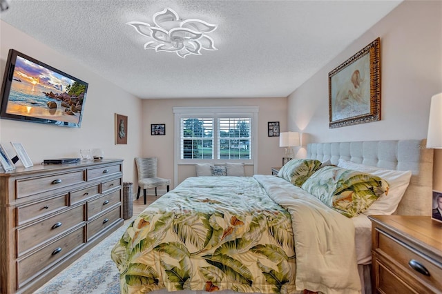 900 Maclaren Dr N Unit D, Palm Harbor, FL 34684 - bedroom with a textured ceiling