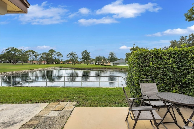 900 Maclaren Dr N Unit D, Palm Harbor, FL 34684 - view of patio / terrace featuring a water view