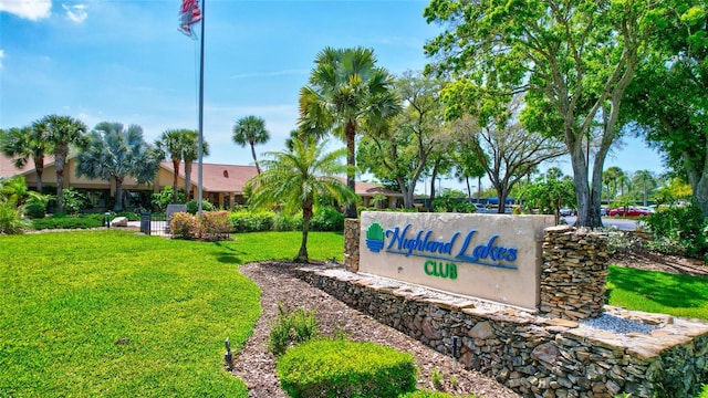 900 Maclaren Dr N Unit D, Palm Harbor, FL 34684 - community / neighborhood sign with a lawn