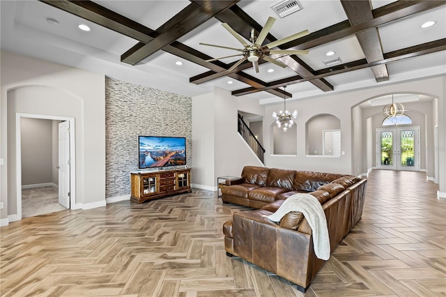 12607 Pensacola Ct, Riverview, FL 33579 - living area with arched walkways, french doors, coffered ceiling, stairway, and recessed lighting